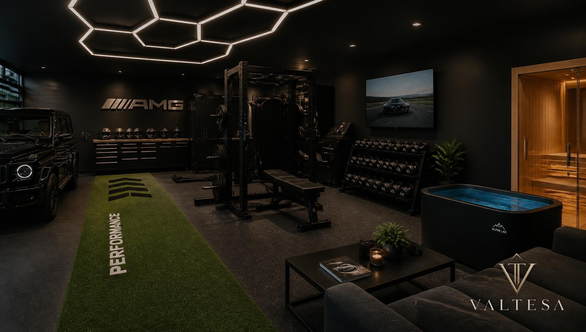 Luxury transformed garage with gym, cold plunge, and sauna